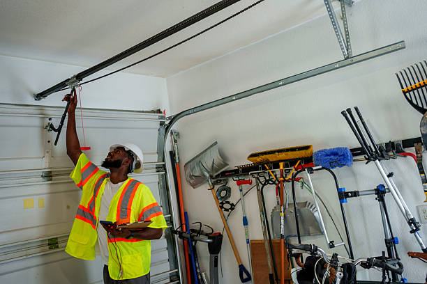 Professional Garage Door Panel Replacement technician working in Verona, MS